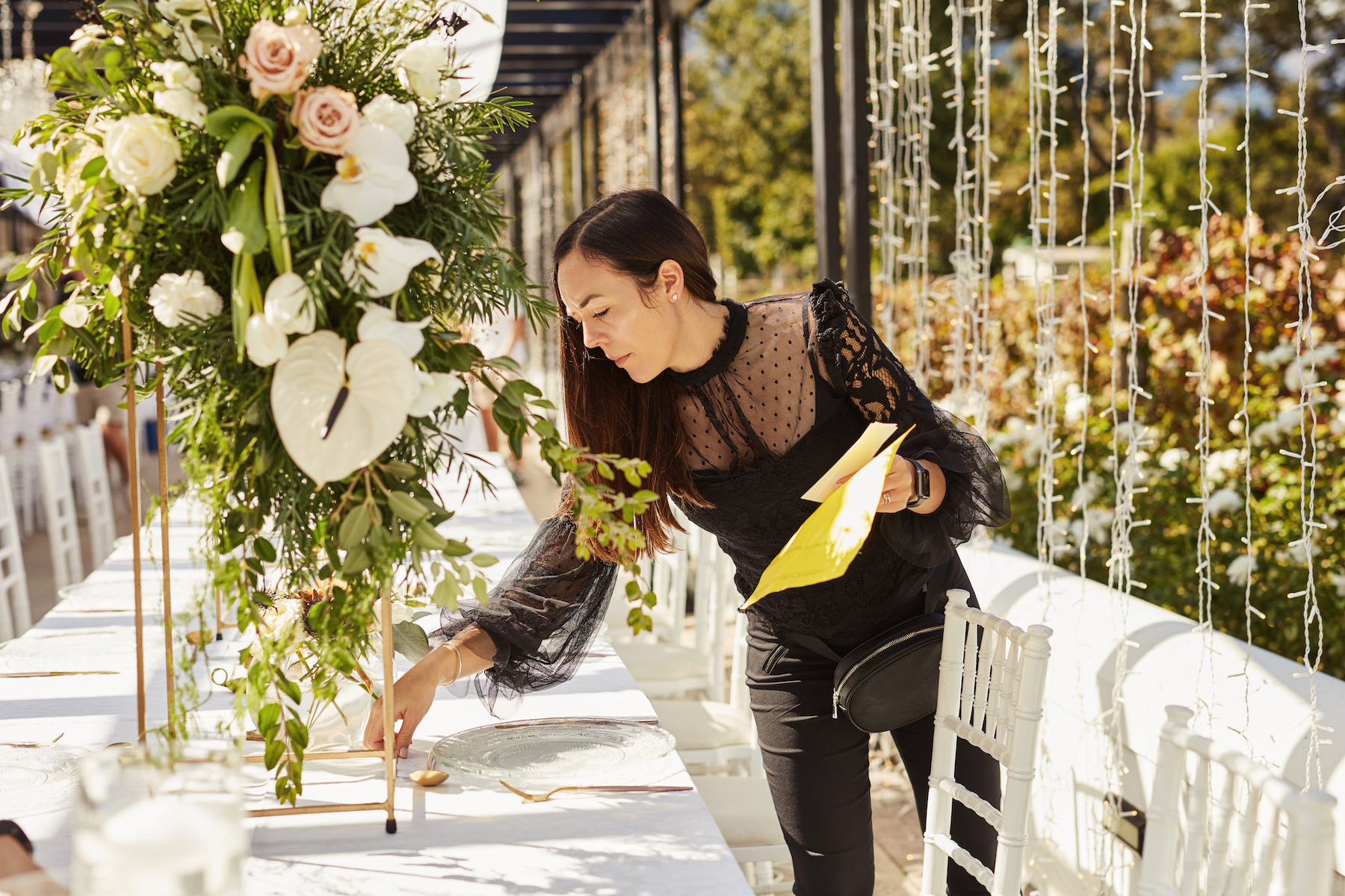 Image of wedding planner setting the table